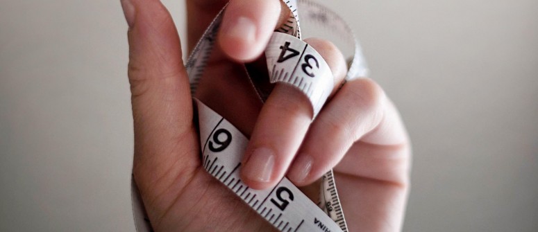tape-measure-on-hand